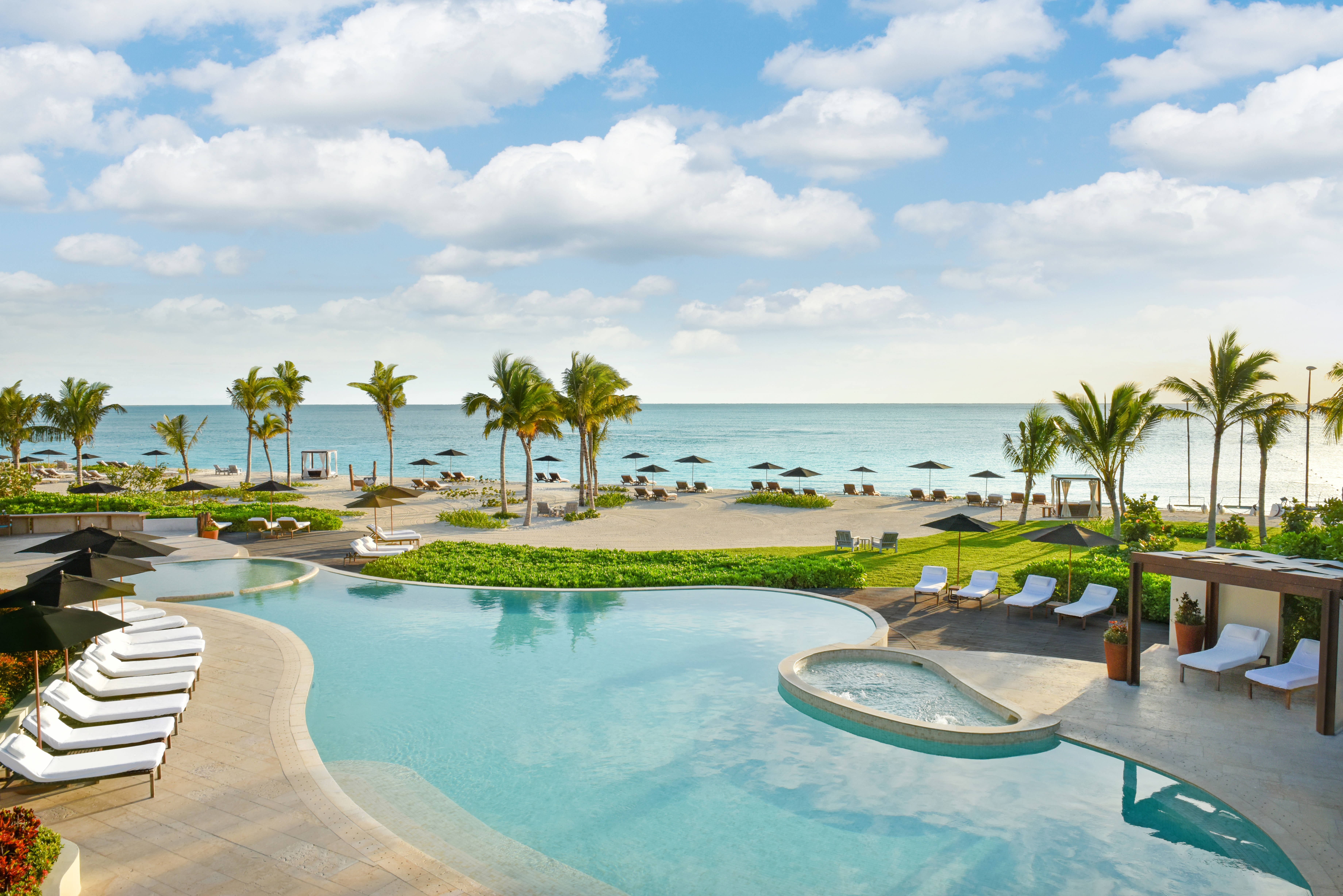 Rosewood Mayakoba private lagoon-front suites and the Punta Bonita beach club within the 1,600-acre Mayakoba mangrove eco-reserve on Mexico's Riviera Maya