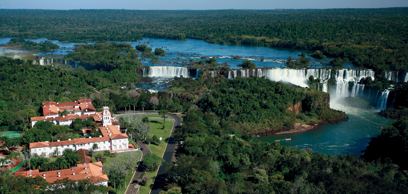 Belmond Hotel das Cataratas — the iconic pink colonial-Portuguese-style heritage hotel set inside Iguaçu National Park on the Brazilian side of the Iguaçu Falls, the only hotel inside the park