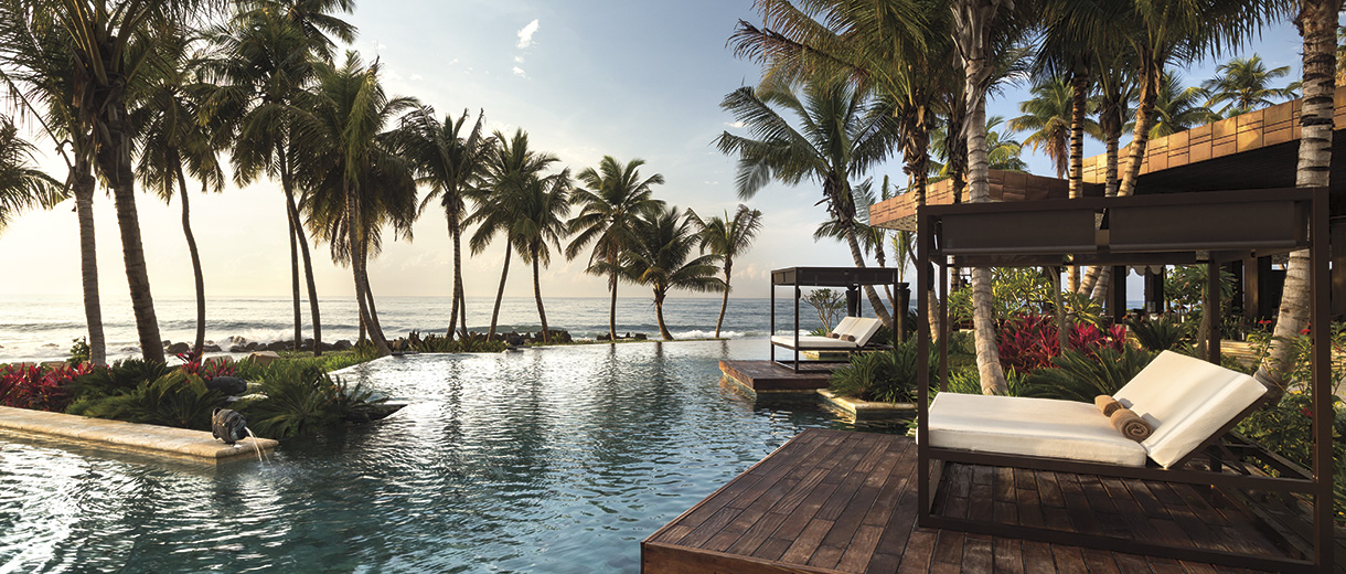 Dorado Beach, a Ritz-Carlton Reserve aerial view showing the Caribbean coastline with the resort's beachfront positioning along Puerto Rico's northern shore