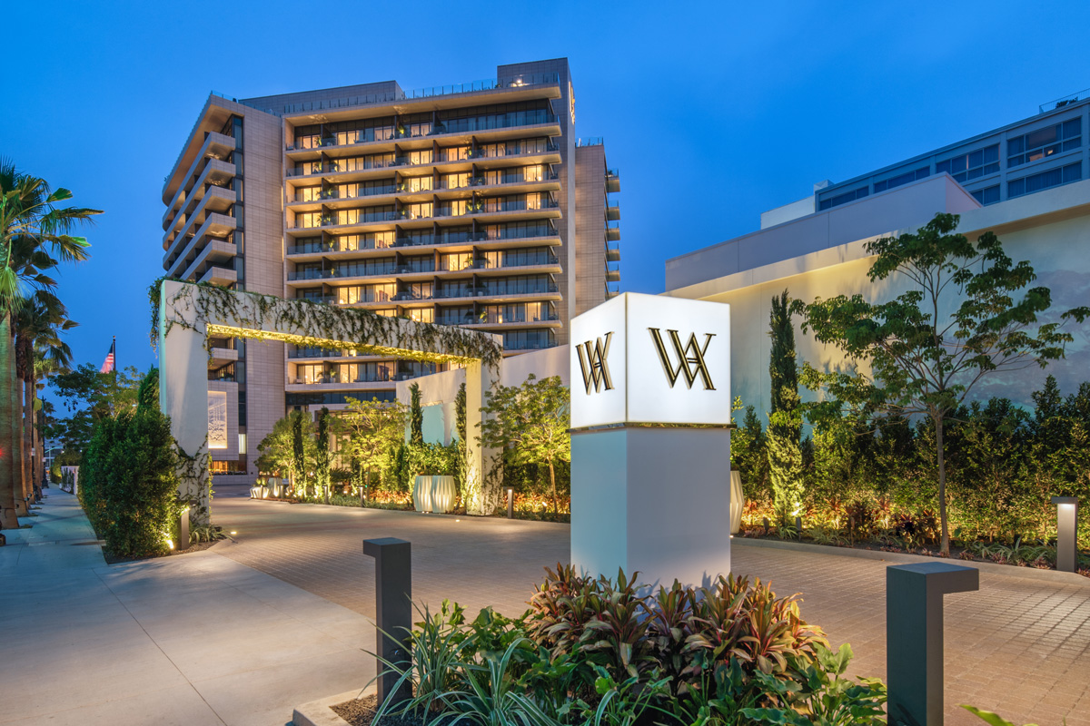 Waldorf Astoria Beverly Hills Mediterranean Revival exterior at the corner of Wilshire and Santa Monica Boulevards — the most architecturally distinctive contemporary luxury hotel in Beverly Hills