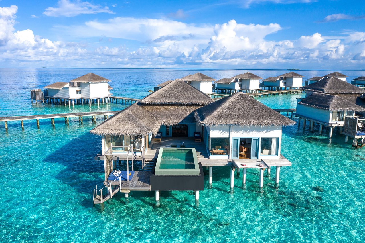 Raffles Maldives Meradhoo overwater villas in the southern Gaafu Alifu Atoll — the only Raffles resort property in the Maldives